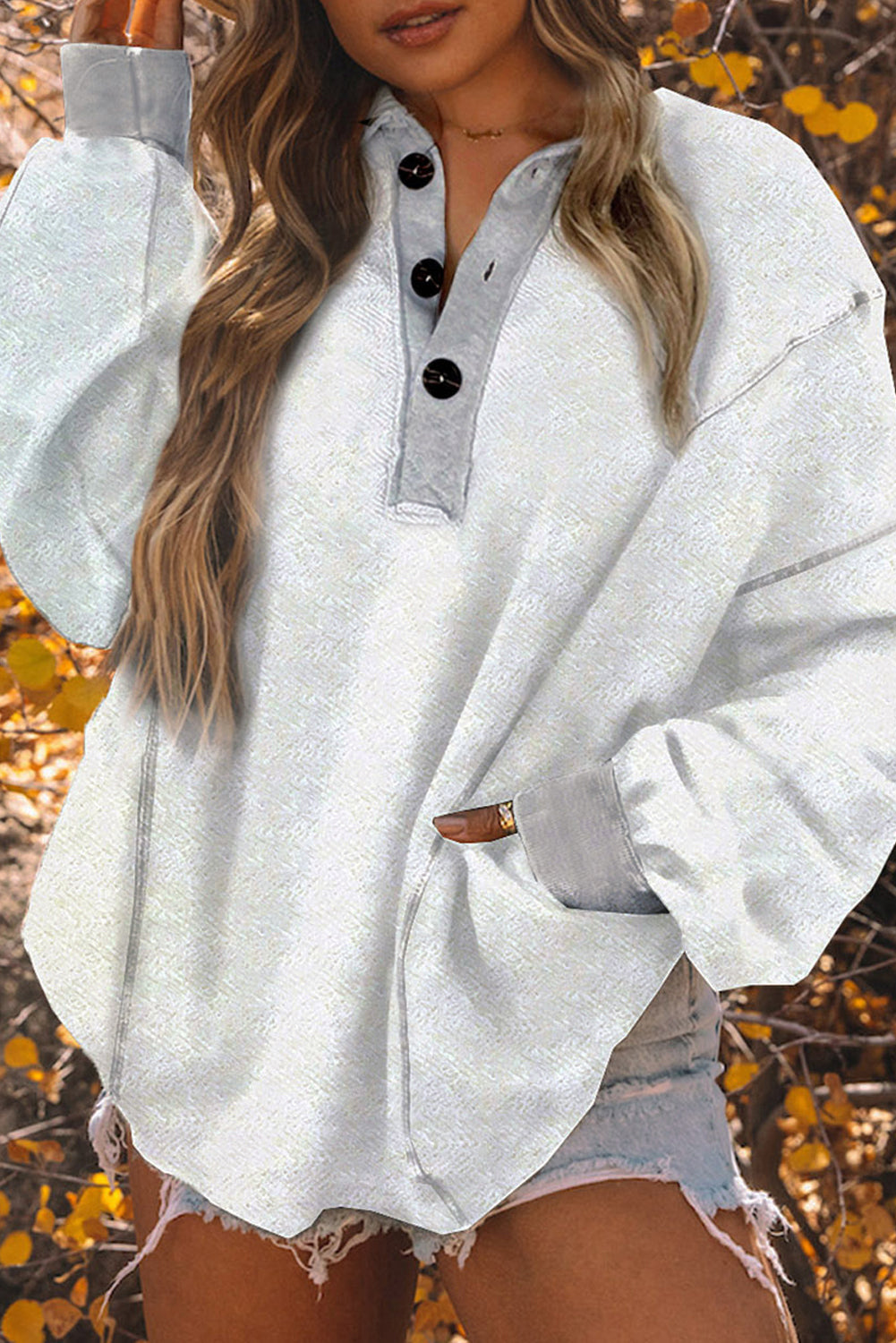 White Textured Side Pockets Buttoned Neckline Sweatshirt